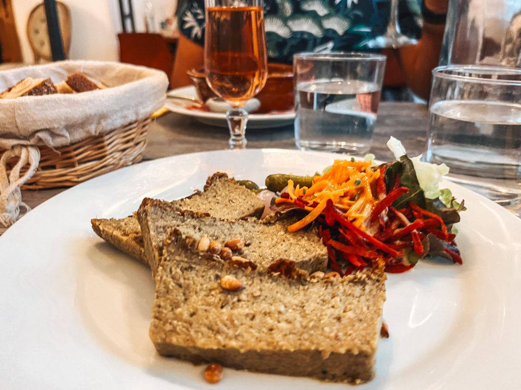 vegan french pate and a glass of rose wine, best vegan french food in paris